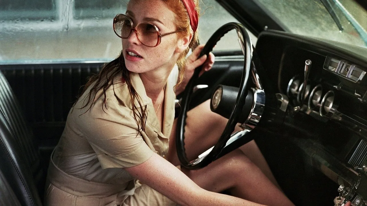 The Lady in the Car with Glasses and a Gun